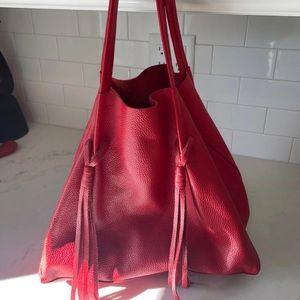 Red leather tote bag